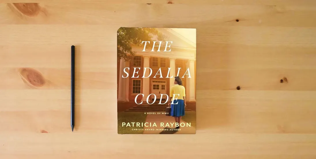 The book The Sedalia Code} is on the table