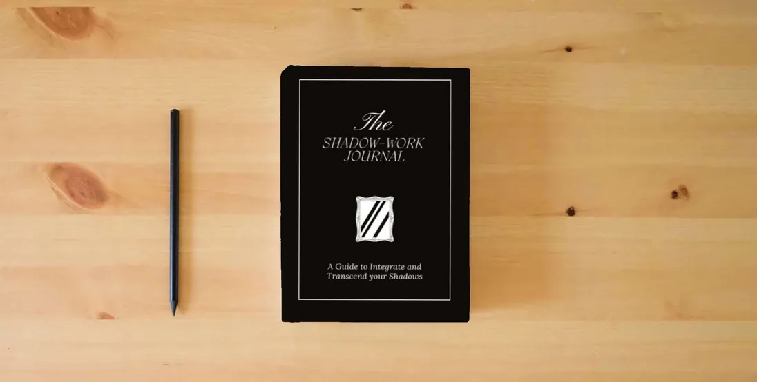 The book The Shadow Work Journal: A Guide to Integrate and Transcend your Shadows} is on the table