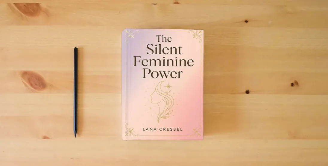 The book The Silent Feminine Power} is on the table