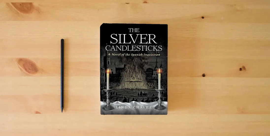 The book The Silver Candlesticks: A Novel of the Spanish Inquisition} is on the table