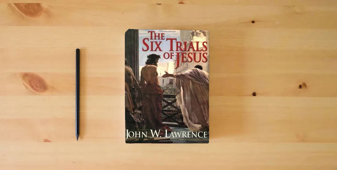 The book The Six Trials of Jesus} is on the table
