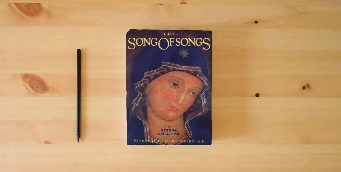 The book The Song of Songs: A Mystical Exposition} is on the table
