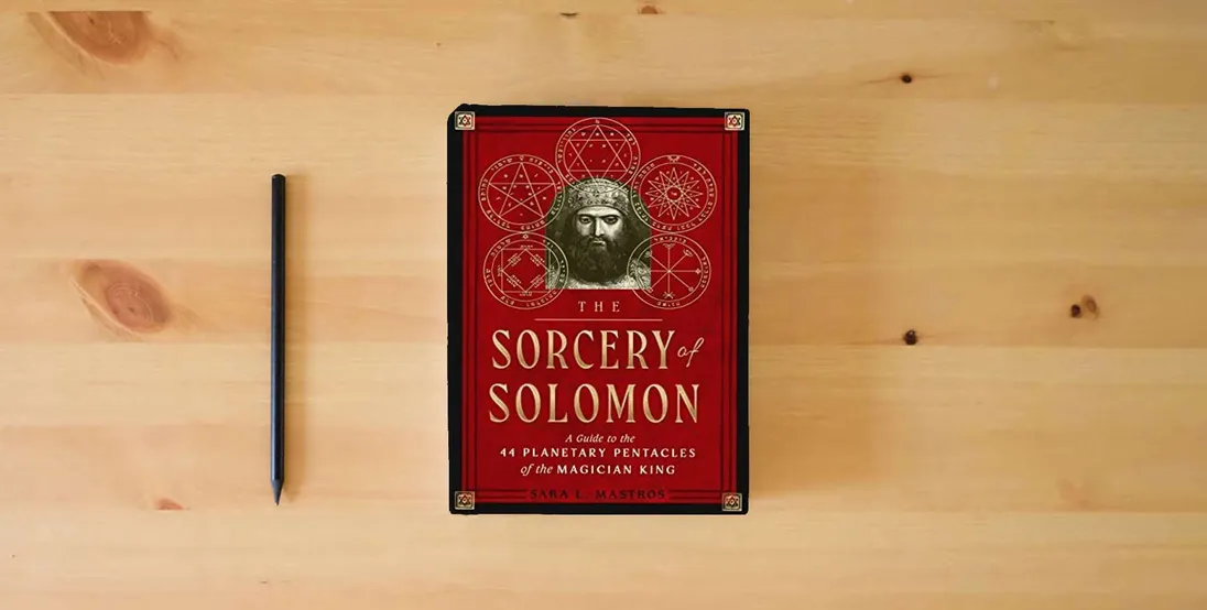 The book The Sorcery of Solomon: A Guide to the 44 Planetary Pentacles of the Magician King} is on the table