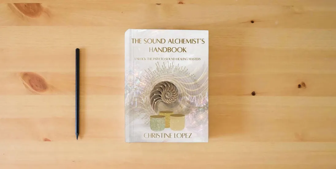 The book The Sound Alchemist's Handbook: Unlocking the Path to Sound Healing Mastery} is on the table