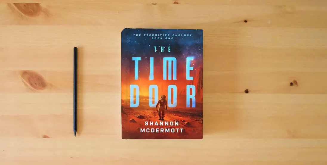 The book The Time Door (Volume 1) (The Eternities)} is on the table