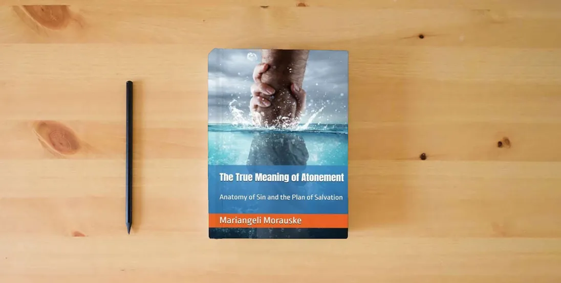 The book The True Meaning of Atonement: Anatomy of Sin and the Plan of Salvation (Faith & Wisdom)} is on the table