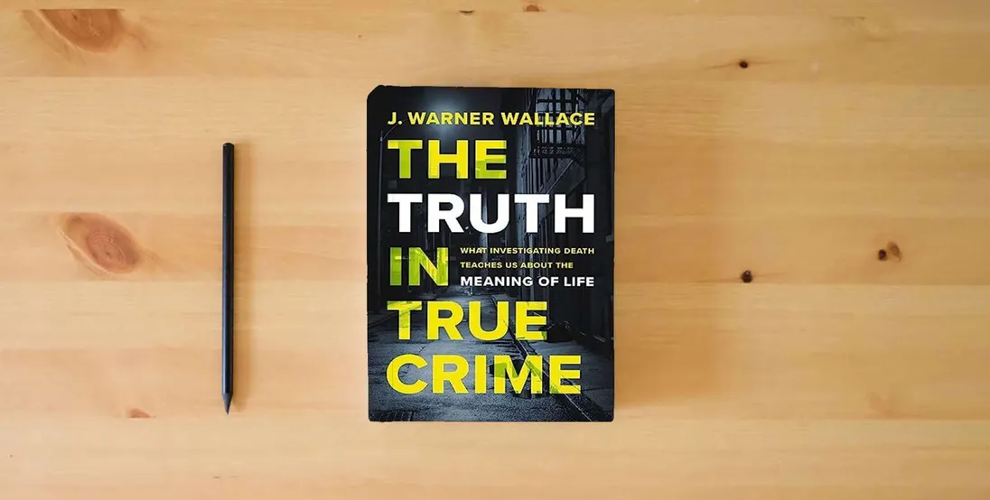 The book The Truth in True Crime: What Investigating Death Teaches Us About the Meaning of Life} is on the table