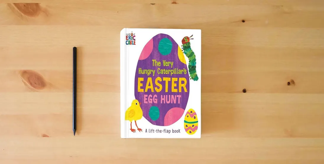 The book The Very Hungry Caterpillar's Easter Egg Hunt: A Lift-the-Flap-Book (World of Eric Carle)} is on the table