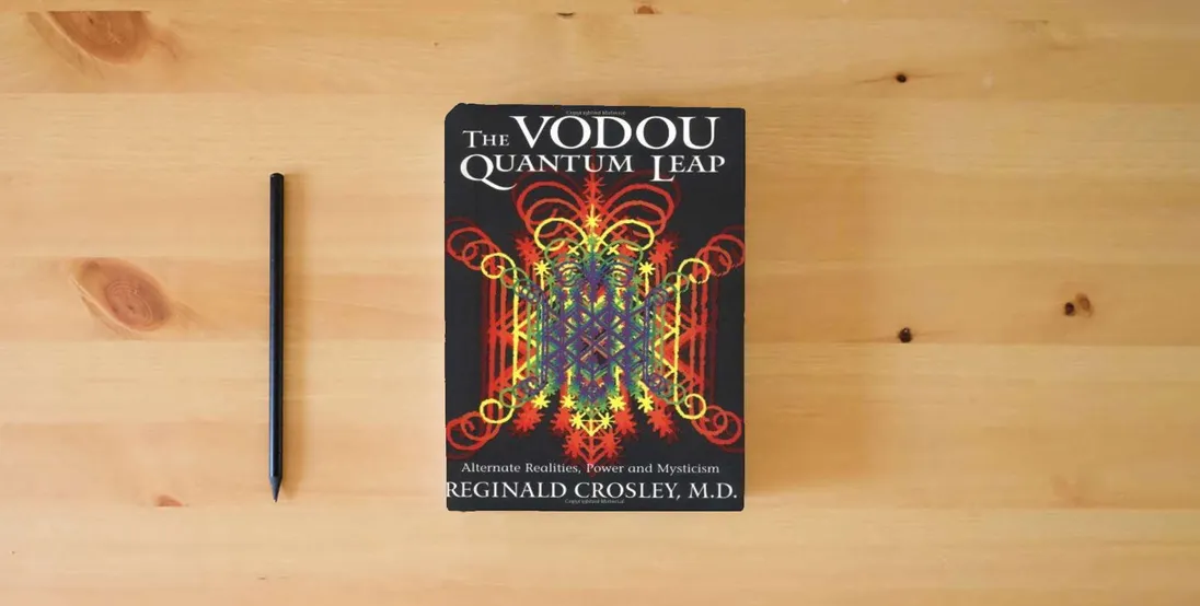 The book The Vodou Quantum Leap: Alternate Realities, Power and Mysticism} is on the table