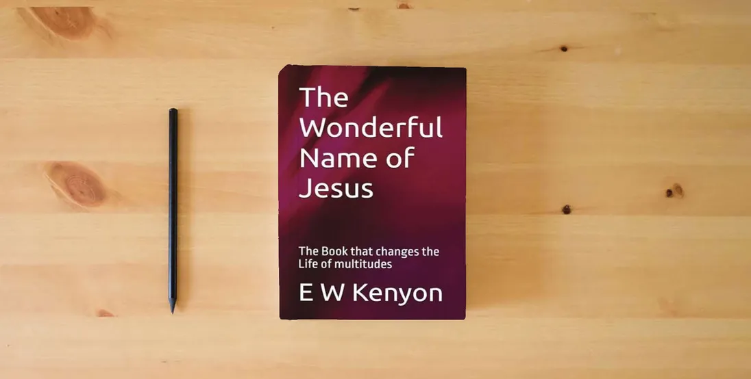 The book The Wonderful Name of Jesus: The Book that changes the Life of multitudes} is on the table