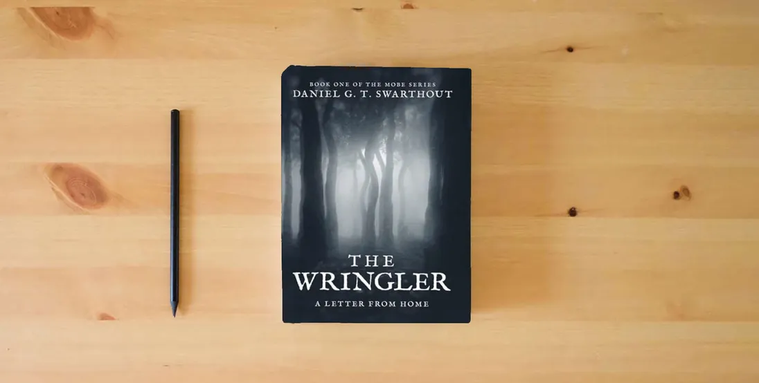 The book The Wringler: A Letter From Home: Book One of the MOBE Series} is on the table
