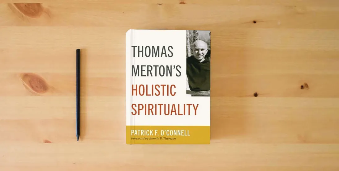 The book Thomas Merton’s Holistic Spirituality} is on the table