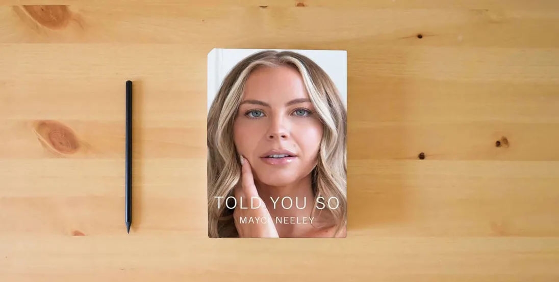 The book Told You So} is on the table