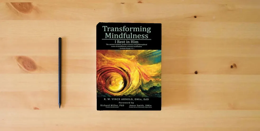 The book Transforming Mindfulness I Rest in Him: The ancient wisdom, modern science and philosophical roots of mindfulness-oriented meditation} is on the table