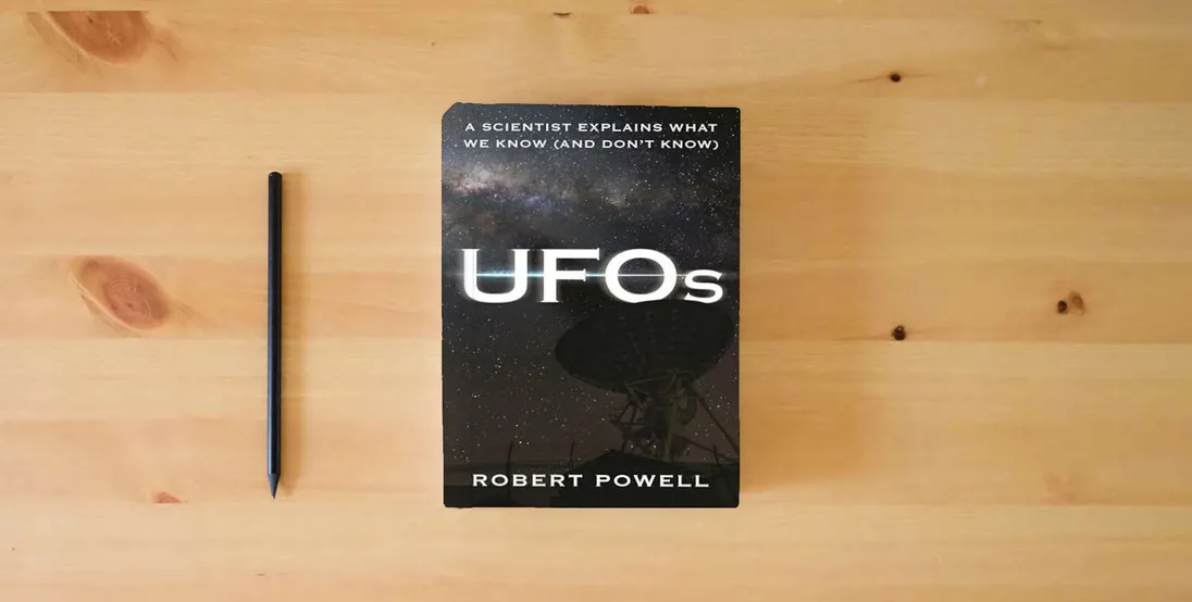 The book UFOs: A Scientist Explains What We Know (And Don’t Know)} is on the table