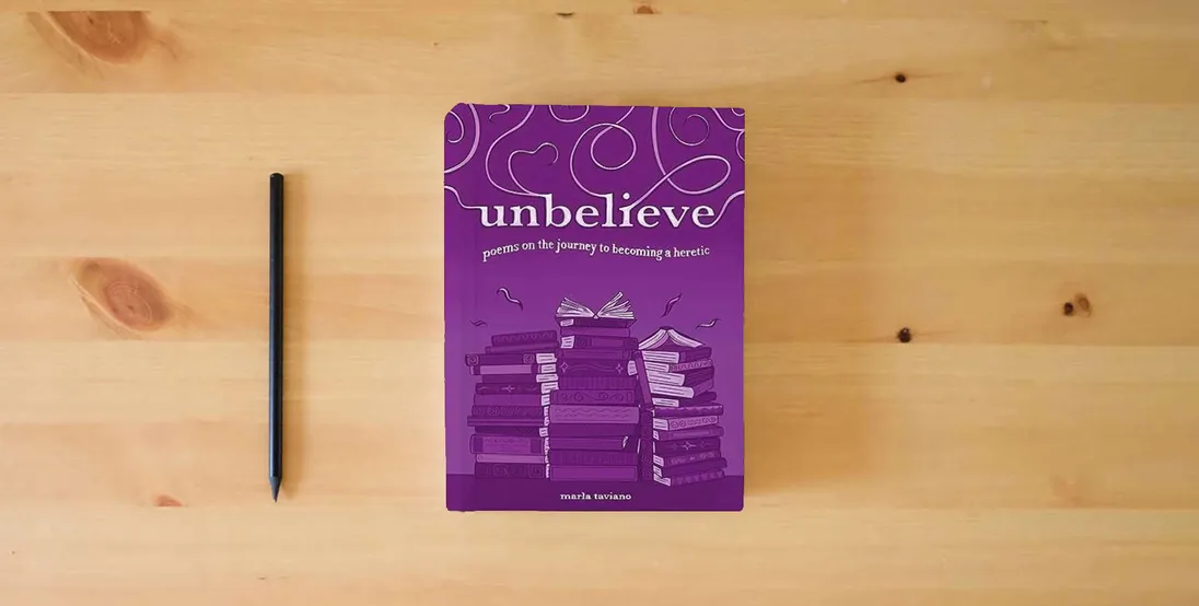 The book unbelieve: poems on the journey to becoming a heretic} is on the table