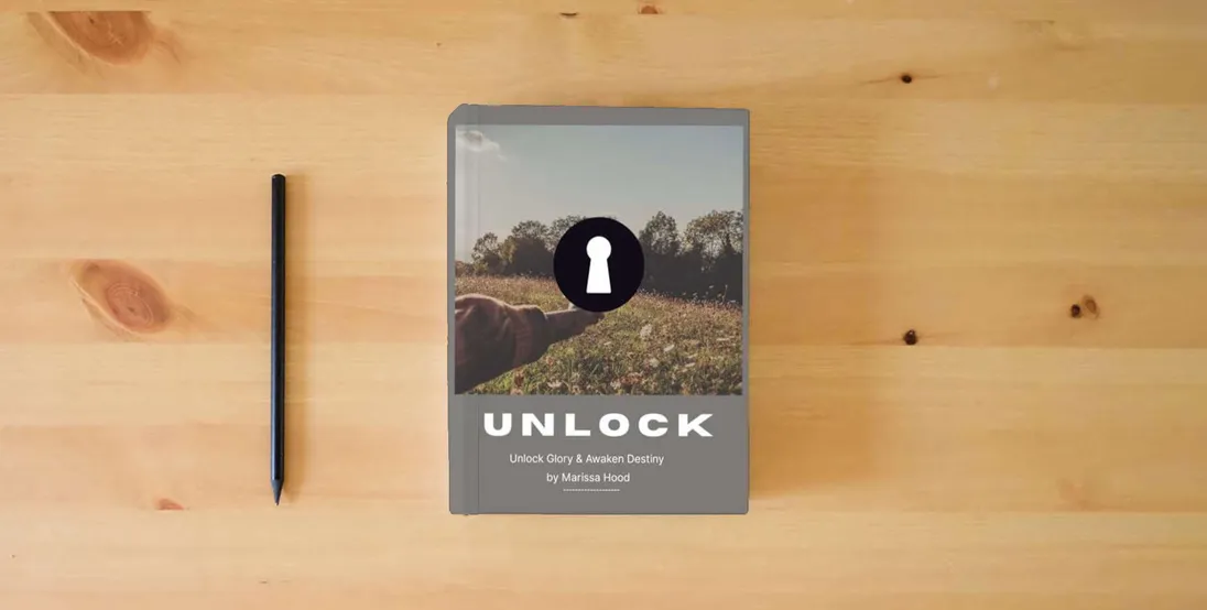 The book UNLOCK: unlock glory and awaken destiny: The Guiding Manual for Release and Breakthrough} is on the table