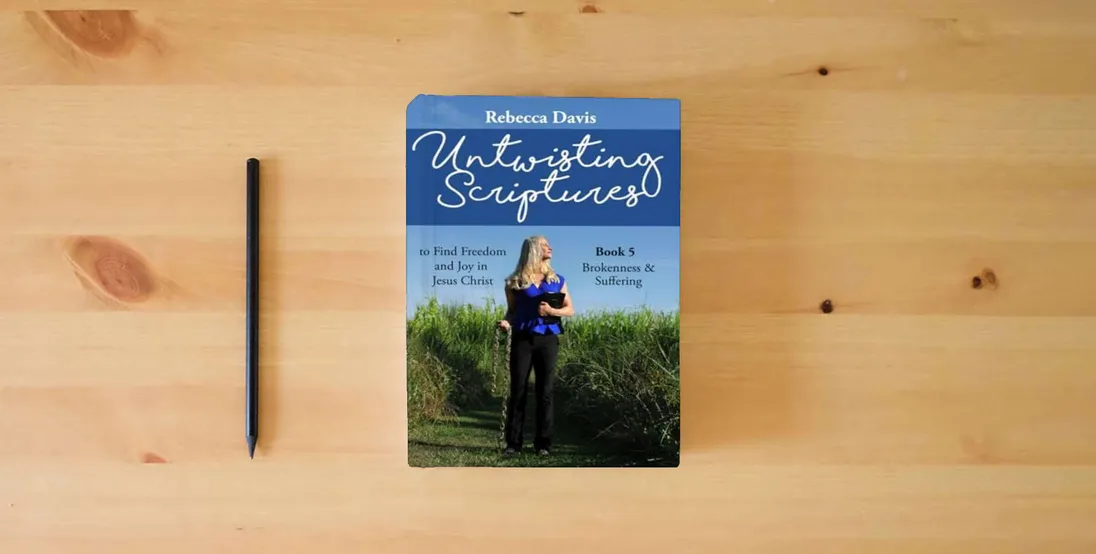 The book Untwisting Scriptures to Find Freedom and Joy in Jesus Christ: Book 5 Brokenness & Suffering} is on the table