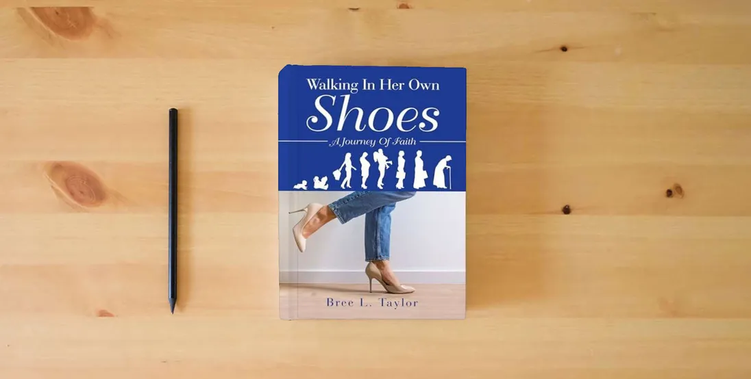 The book Walking In Her Own Shoes: A Journey Of Faith} is on the table