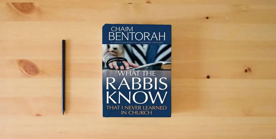 The book What the Rabbis Know That I Never Learned in Church} is on the table