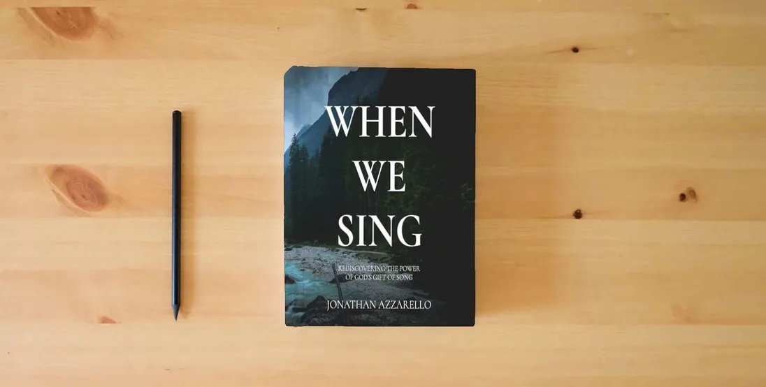 The book When We Sing: Rediscovering the Power of God's Gift of Song} is on the table