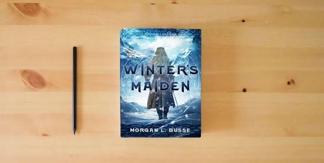 The book Winter's Maiden (Volume 1) (The Nordic Wars)} is on the table