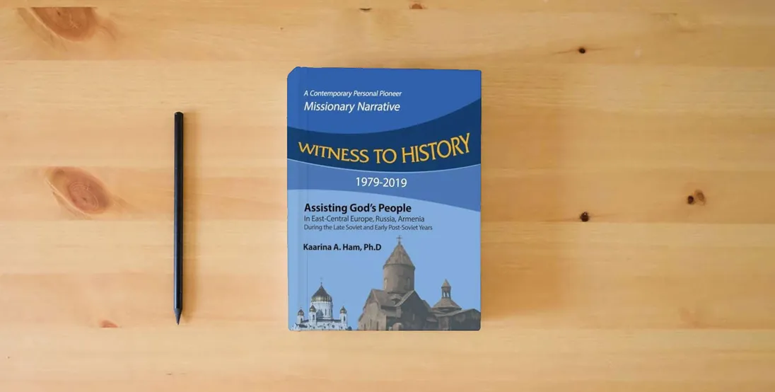 The book Witness to History 1979-2019: Assisting God's People in East-Central Europe, Russia, Armenia During the Late Soviet and Early Post-Soviet Years} is on the table