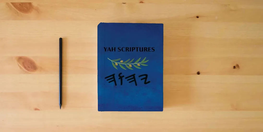 The book Yah Scriptures} is on the table