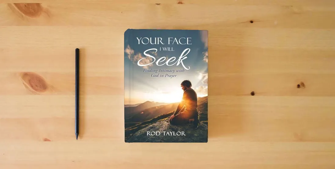 The book Your Face I Will Seek: Finding Intimacy with God in Prayer} is on the table